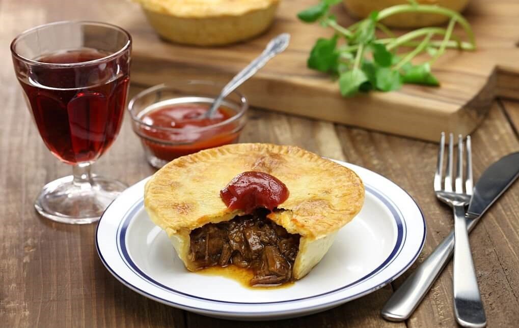 Aussie meat pie, a popular Australian pastry filled with meat.